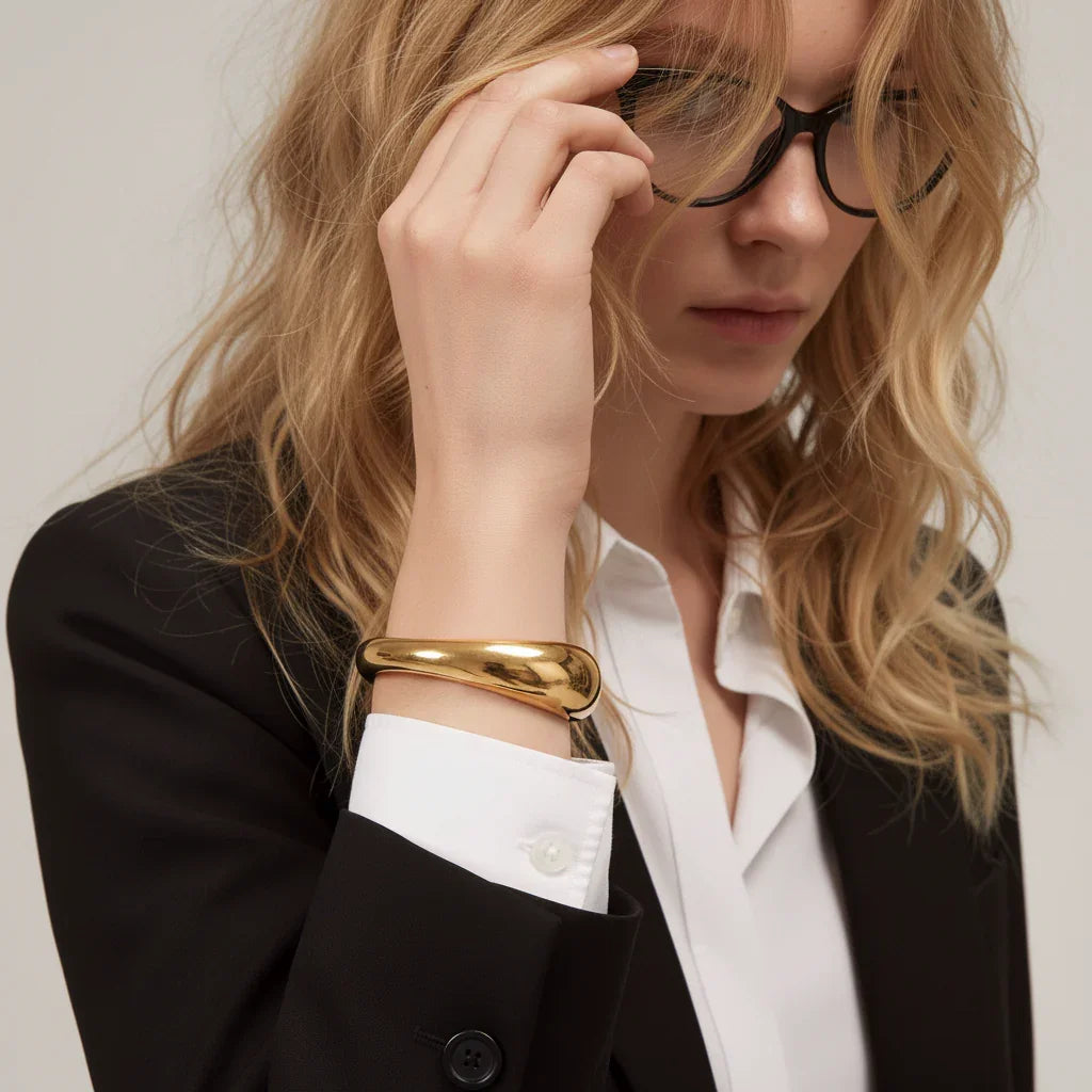 Nora Sculpted Gold Bangle